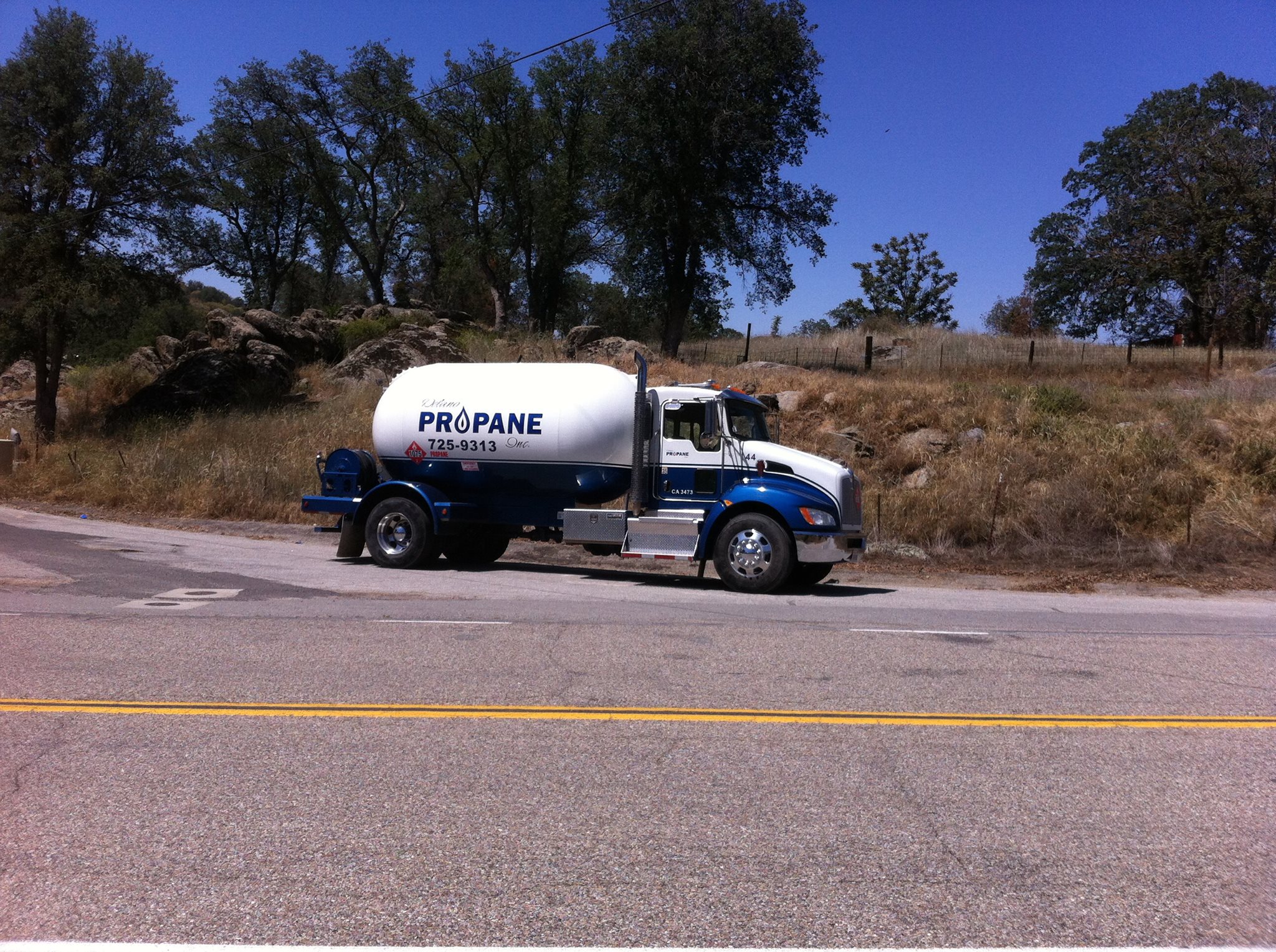 Delano Propane delivery truck on a country road near Delano, California